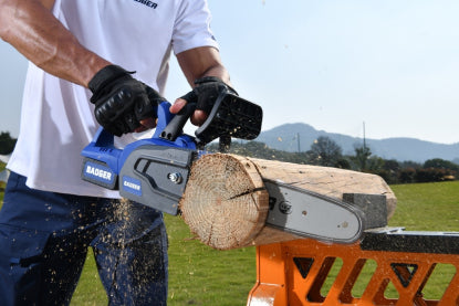 Battery cordless chainsaw in use, perfect for eco-friendly and quiet operation in residential areas.
